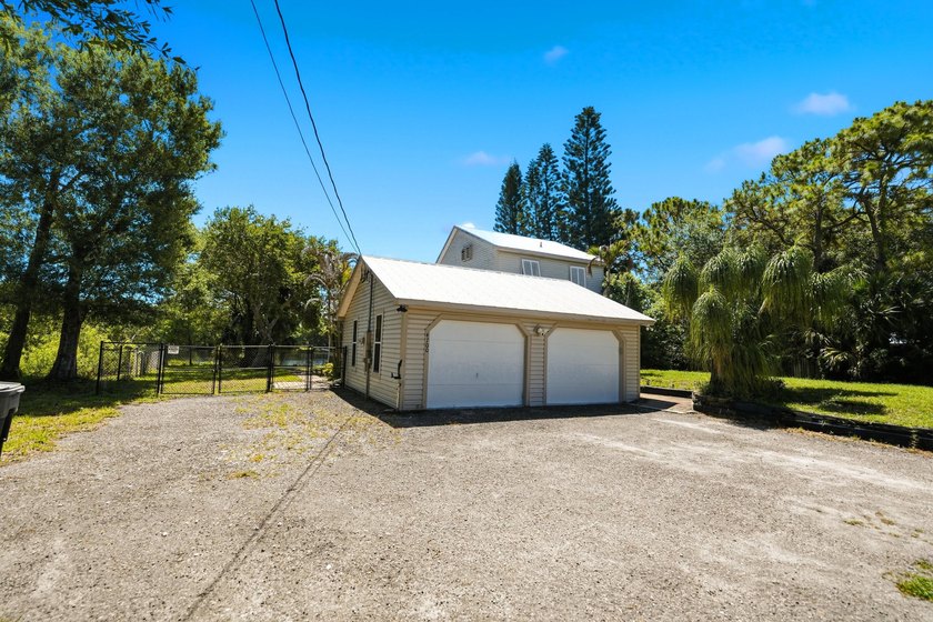 Rare lakefront sanctuary with endless possibilities! Own this - photo 9