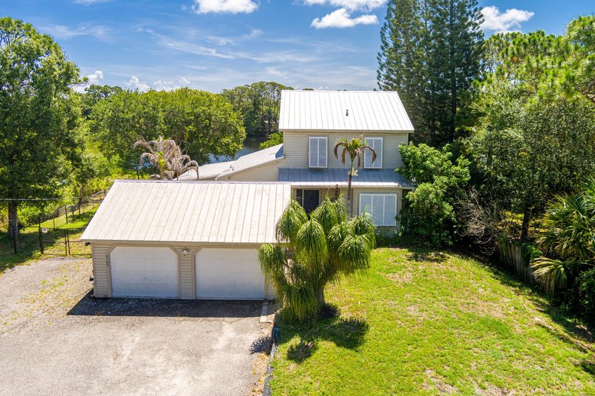 Rare lakefront sanctuary with endless possibilities! Own this - photo 10