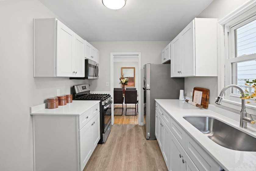 Fresh renovations and a thoughtful layout make this 3-bedroom - photo 14