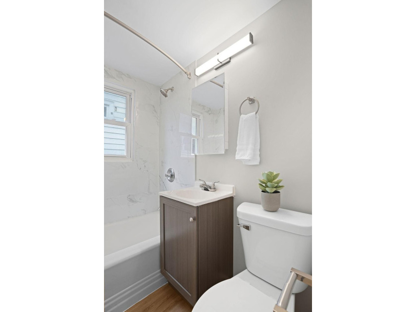 Fresh renovations and a thoughtful layout make this 3-bedroom - photo 21