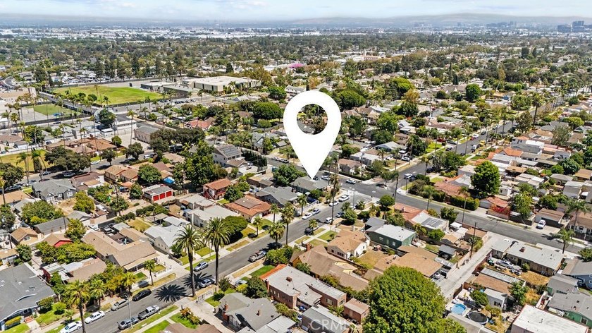 Step into the charm of this historic Santa Ana cottage, where - photo 11