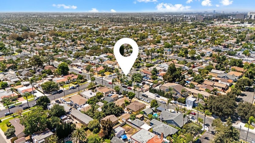 Step into the charm of this historic Santa Ana cottage, where - photo 15