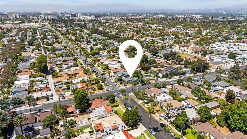 Step into the charm of this historic Santa Ana cottage, where - photo 17