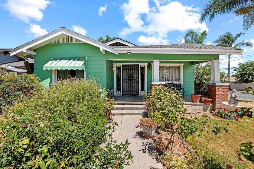 Step into the charm of this historic Santa Ana cottage, where - photo 19