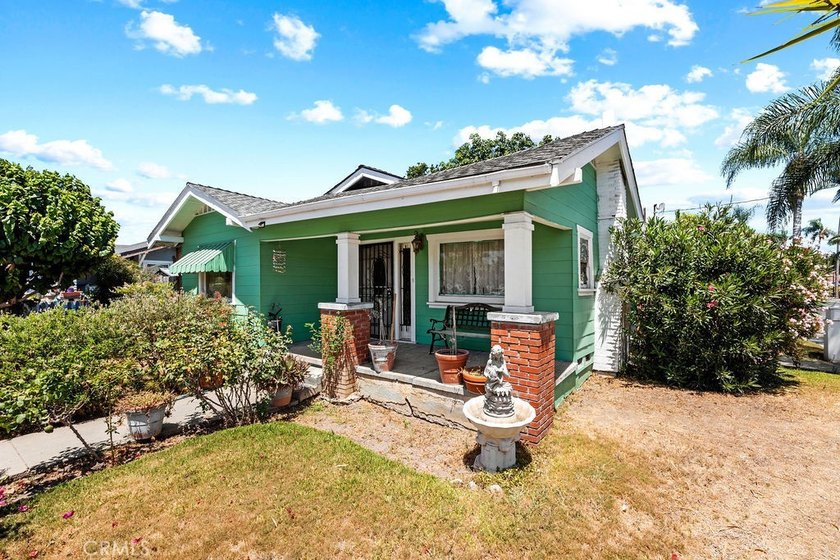 Step into the charm of this historic Santa Ana cottage, where - photo 21