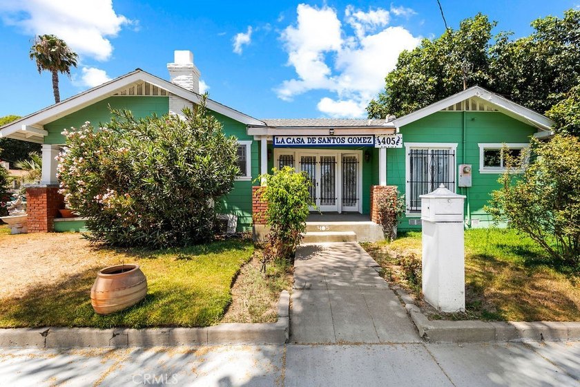 Step into the charm of this historic Santa Ana cottage, where - photo 22