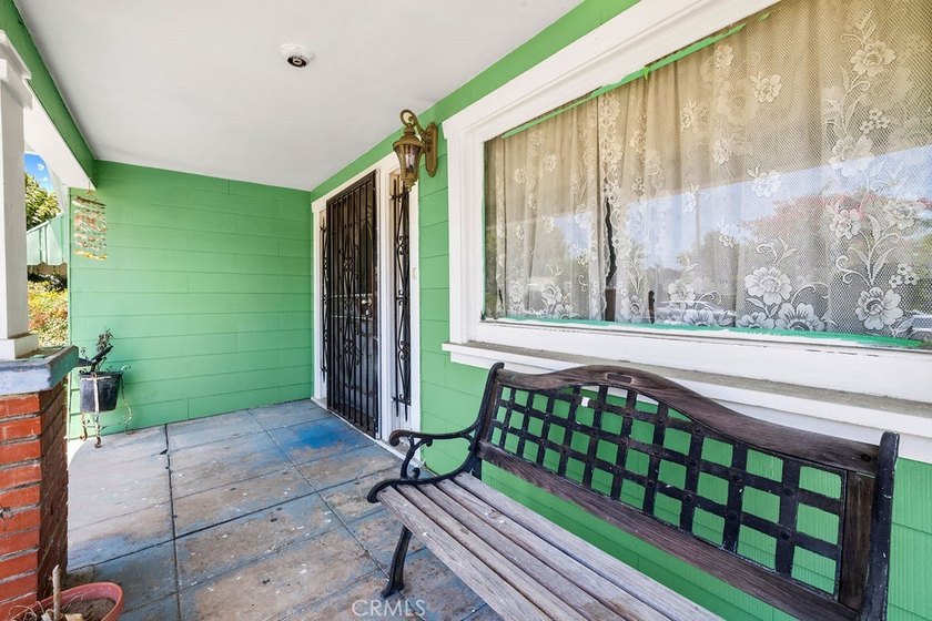 Step into the charm of this historic Santa Ana cottage, where - photo 24