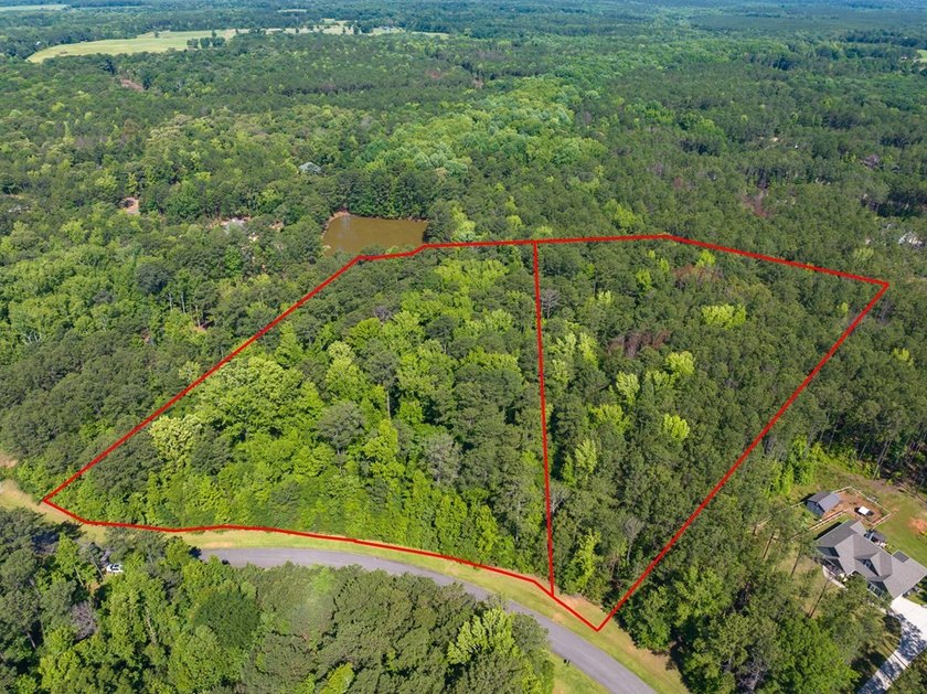 Almost six acres in an established neighborhood with lake - photo 6
