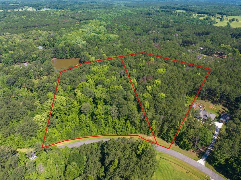 Almost six acres in an established neighborhood with lake - photo 8