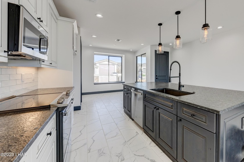 This well-equipped home plan by Merrill Home Builders includes - photo 9
