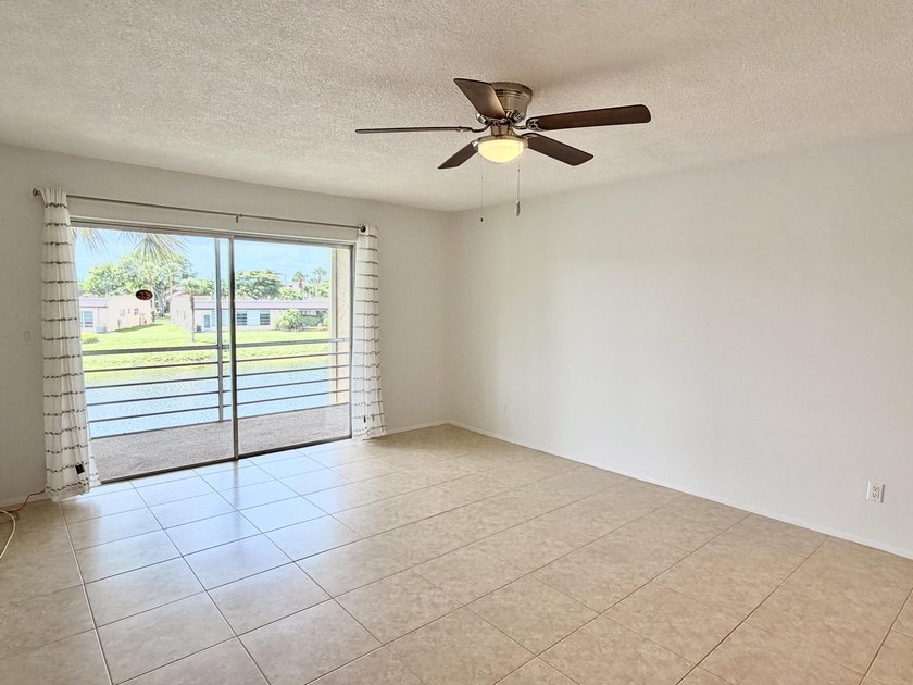 Motivated Seller!! Move-in ready 2BR/2BA 2nd-floor corner condo - photo 9