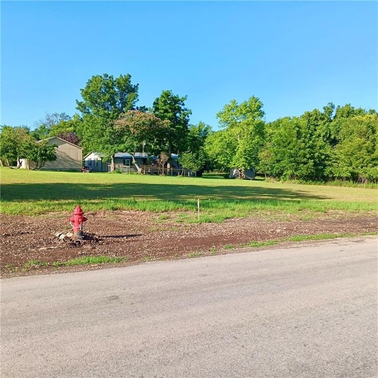 Come check out this rare 0.63-acre triple lot opportunity! The - photo 2