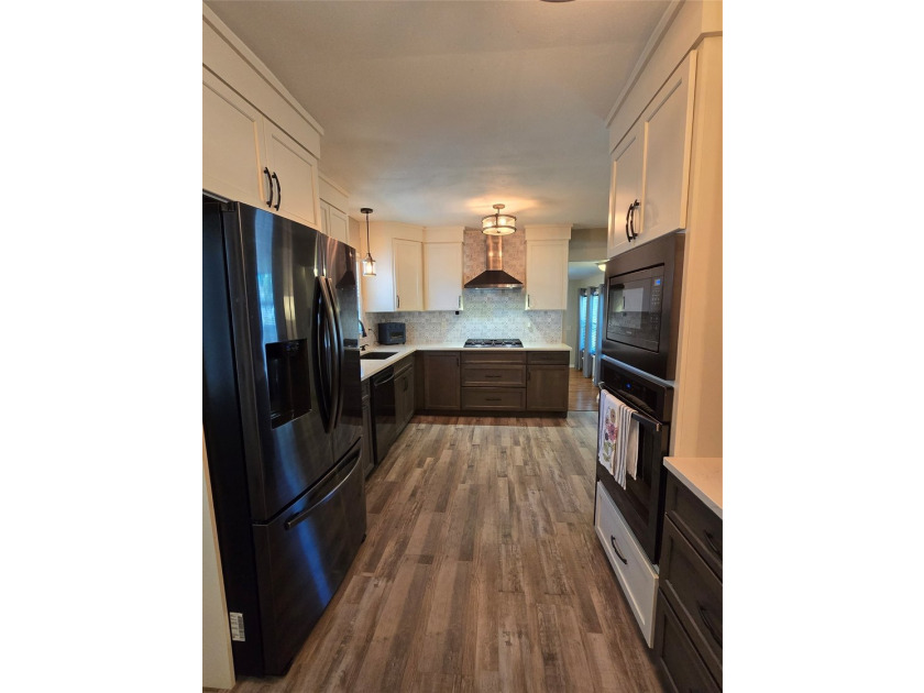Beautifully updated and thoughtfully maintained, this three - photo 12