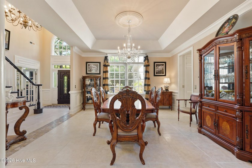 Set within the prestigious community of Landfall, this elegant - photo 16