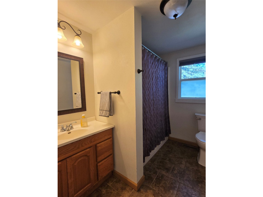 Beautifully updated and thoughtfully maintained, this three - photo 18