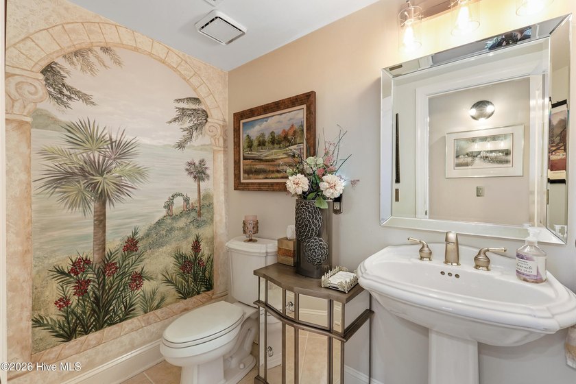 Set within the prestigious community of Landfall, this elegant - photo 26