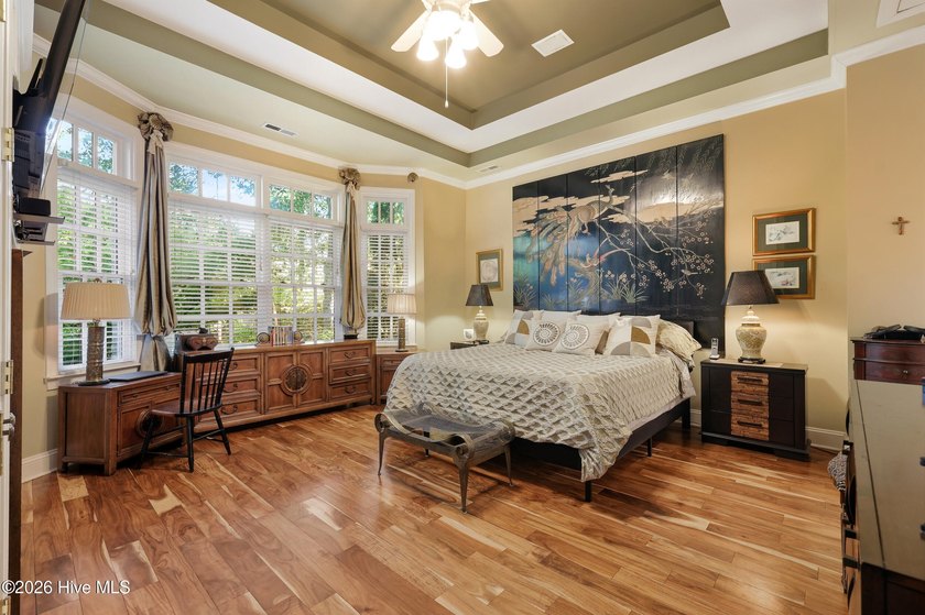 Set within the prestigious community of Landfall, this elegant - photo 32