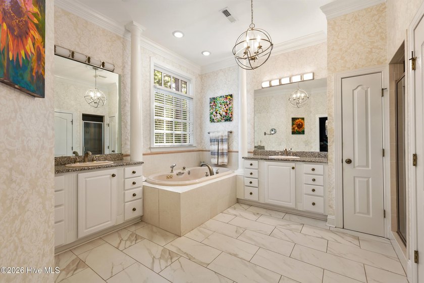Set within the prestigious community of Landfall, this elegant - photo 37