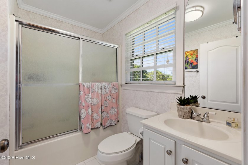 Set within the prestigious community of Landfall, this elegant - photo 39