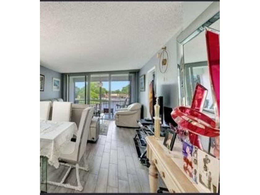 Step into this beautifully updated 2-bedroom, 2-bathroom condo - photo 2