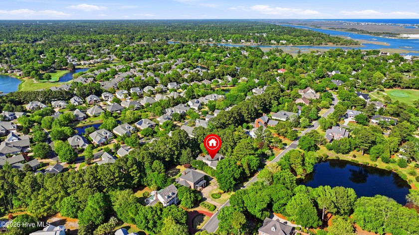 Set within the prestigious community of Landfall, this elegant - photo 59