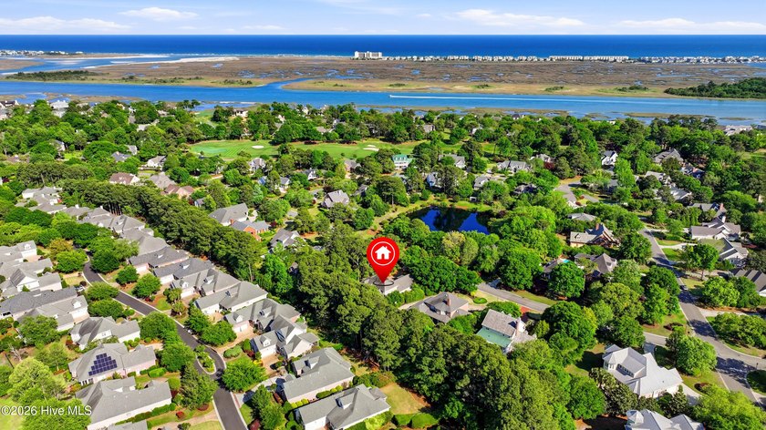 Set within the prestigious community of Landfall, this elegant - photo 60