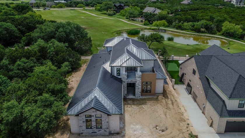 ONE MONTH OUT!! Brand-new luxury construction in the prestigious - photo 3