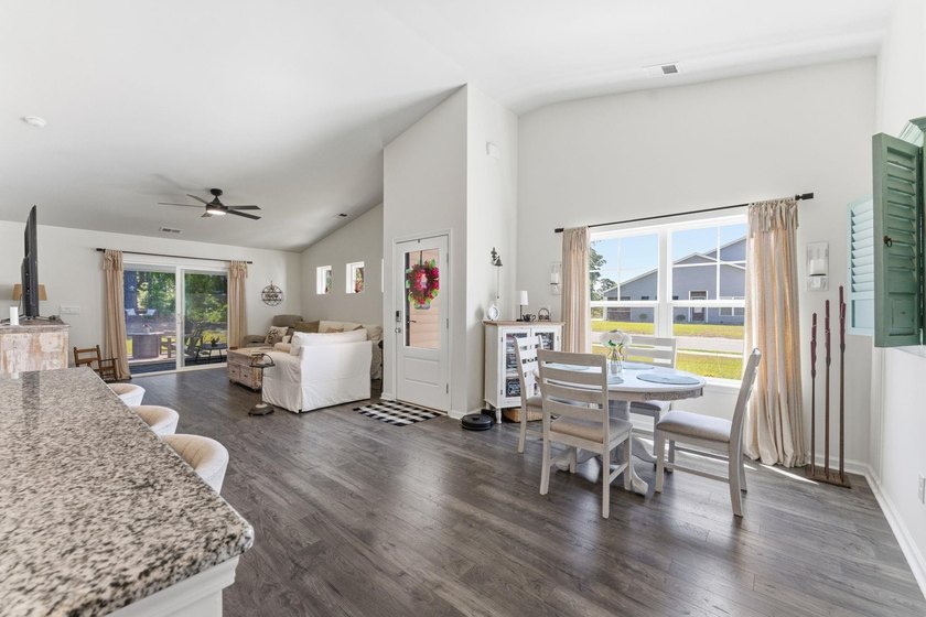 Situated in the Towns at Heather Glen community, this light and - photo 11