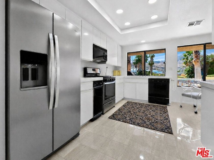 Set lakeside in one of the most desirable perimeter locations - photo 11