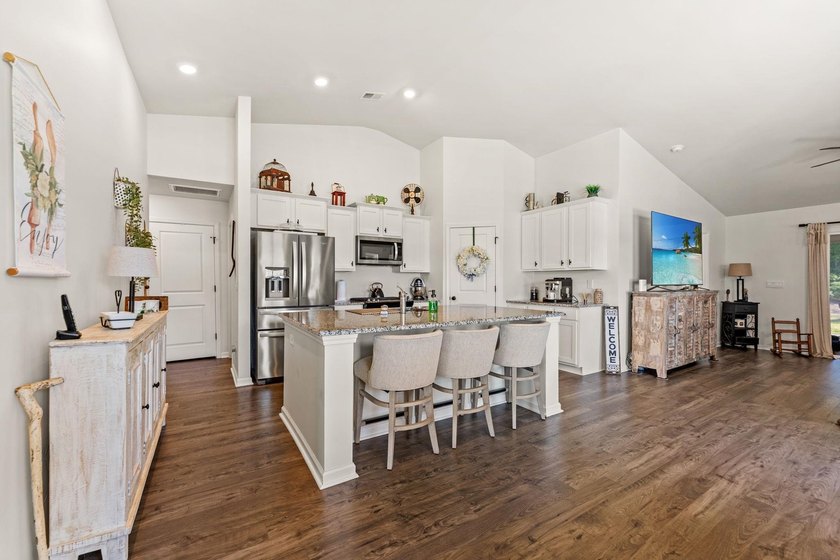 Situated in the Towns at Heather Glen community, this light and - photo 13