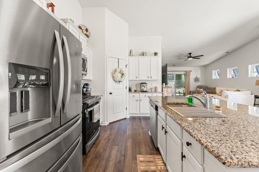 Situated in the Towns at Heather Glen community, this light and - photo 17