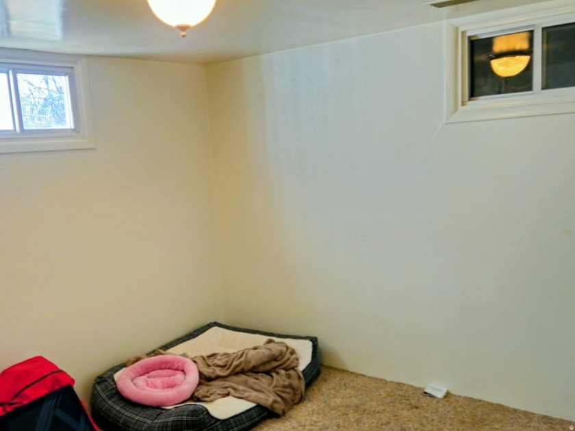 Take a look at this inviting 4-bedroom, 2-bathroom home tucked - photo 17