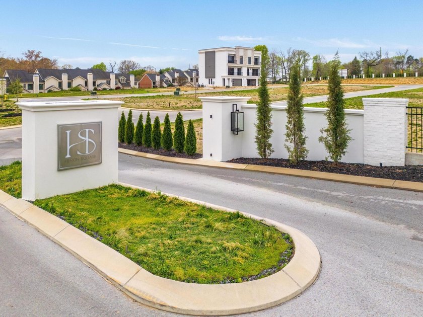 Welcome to Heron Square, an exclusive gated townhome community - photo 2