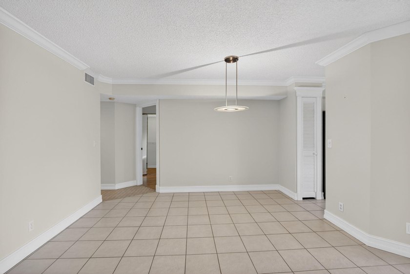 BEAUTIFULLY MAINTAINED 2-BEDROOM, 2-BATHROOM FIRST-FLOOR UNIT IN - photo 11