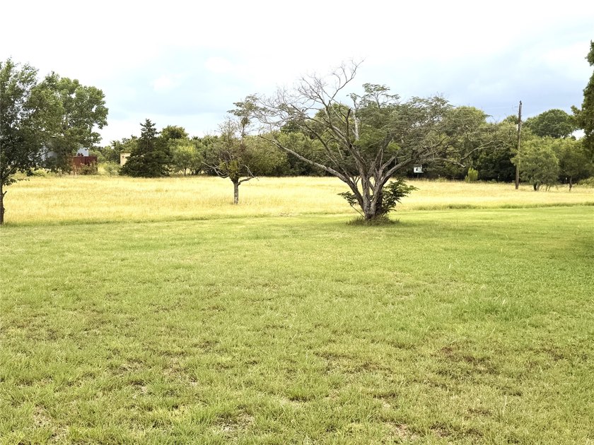 You've got to come see this charming 90 plus year old farmhouse - photo 3