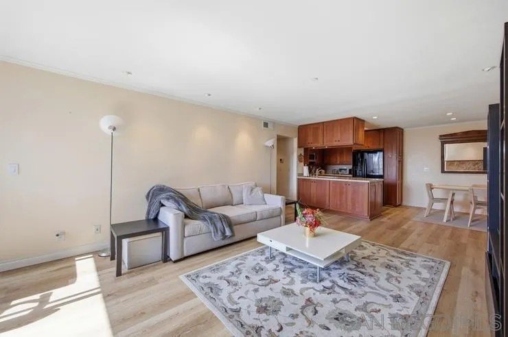 This top-floor sun-filled condo located in the center of the - photo 22