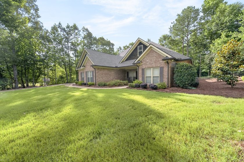Welcome to 144 Mustang Trail in the desirable Ellerslie Place - photo 3