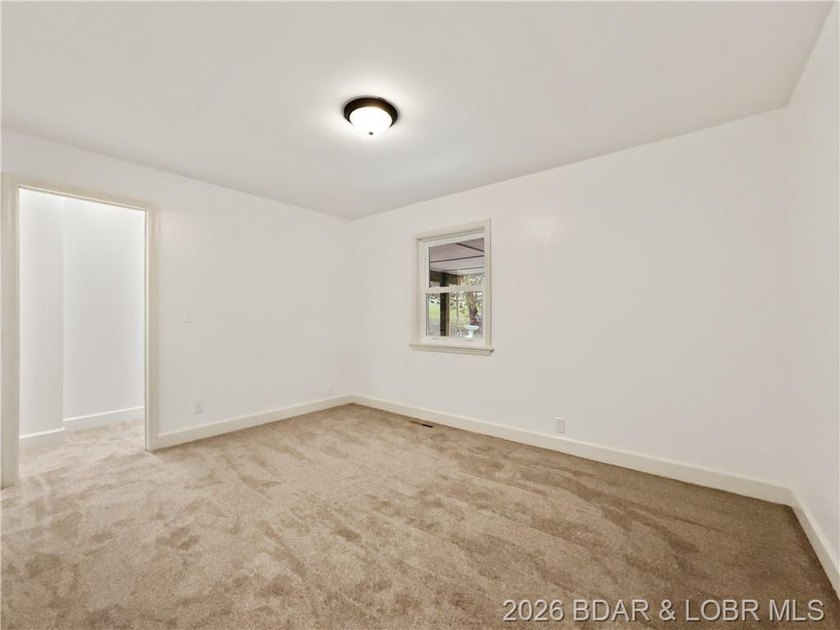 EXTREMELY MOTIVATED SELLER. Nearly flat lakefront yard, acreage - photo 25