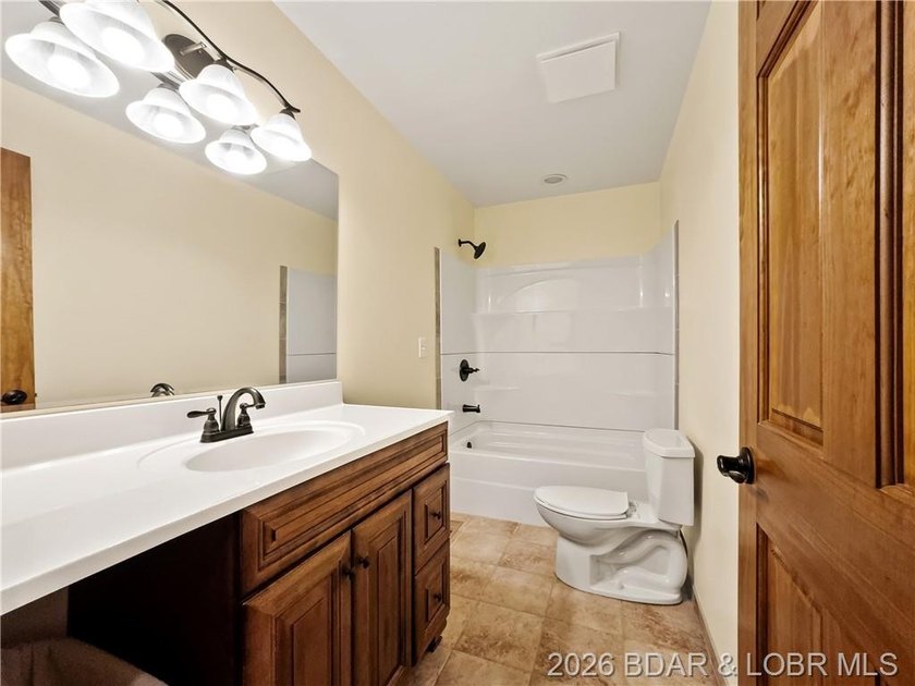EXTREMELY MOTIVATED SELLER. Nearly flat lakefront yard, acreage - photo 26