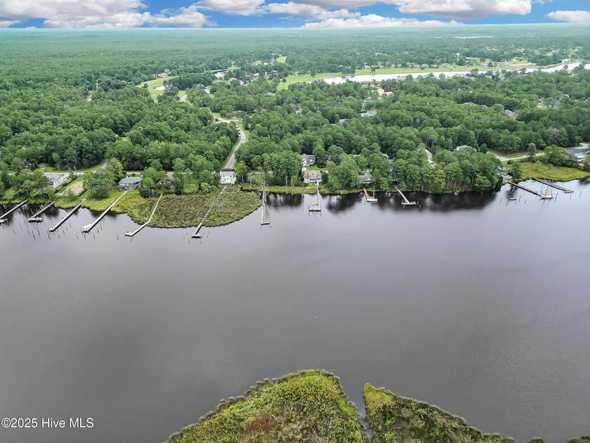 Waterfront homesite with extensive dock frontage in the gated - photo 14