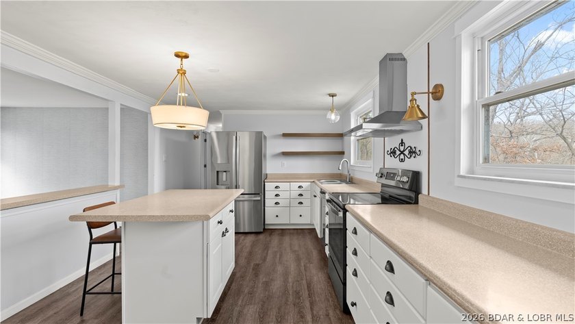 Welcome to this spacious 5-bedroom, 2-bath home in the Malibu - photo 16