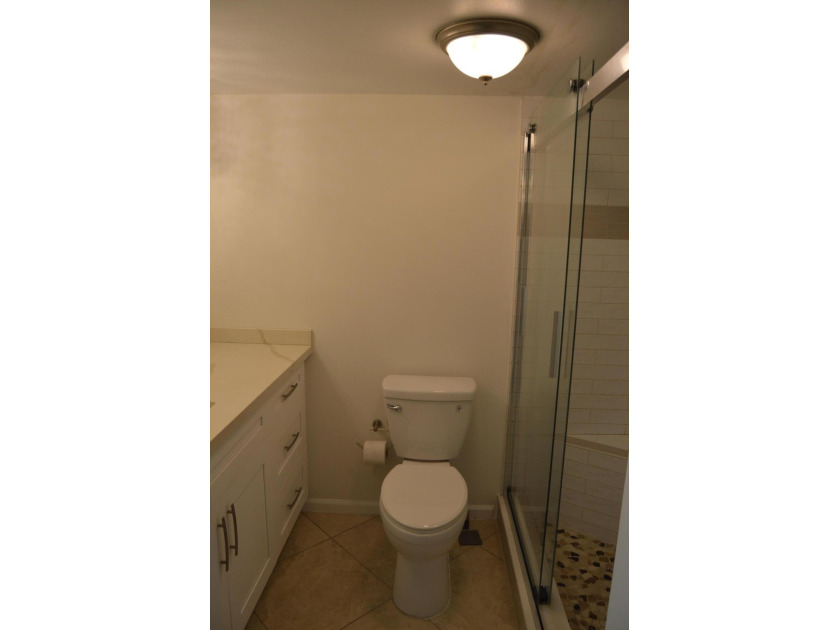 Introducing Unit 303 at French Village Condominiums, a charming - photo 15