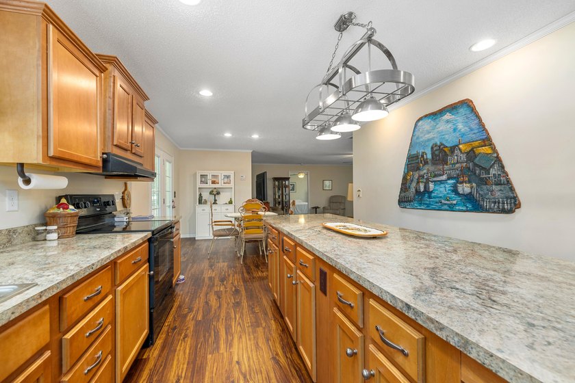 Enjoy country living on this 10-acre property with two homes - photo 21