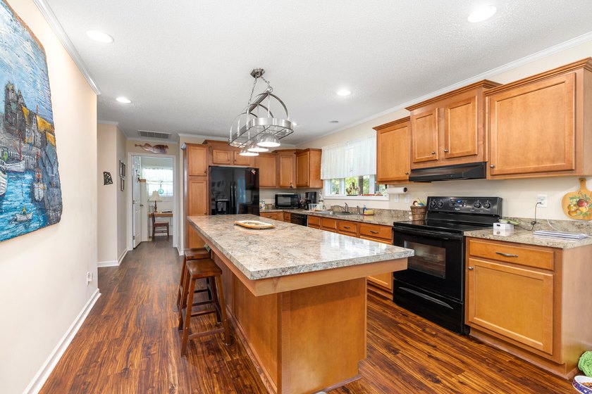 Enjoy country living on this 10-acre property with two homes - photo 22