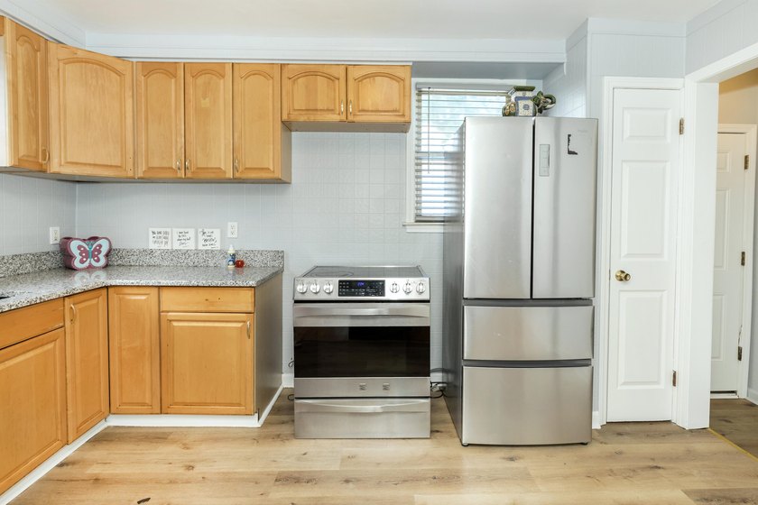 Welcome to this updated 4 bedroom 2 bath home. The beauty - photo 8