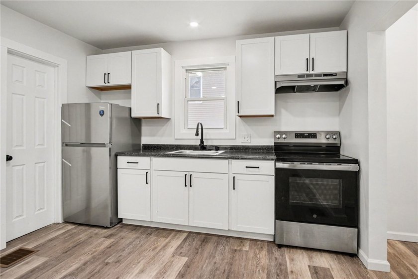 Turnkey investment opportunity or ideal owner-occupied duplex! - photo 11