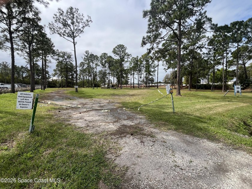 This 2.45 Industrial lot is cleared and has a foundation of - photo 13