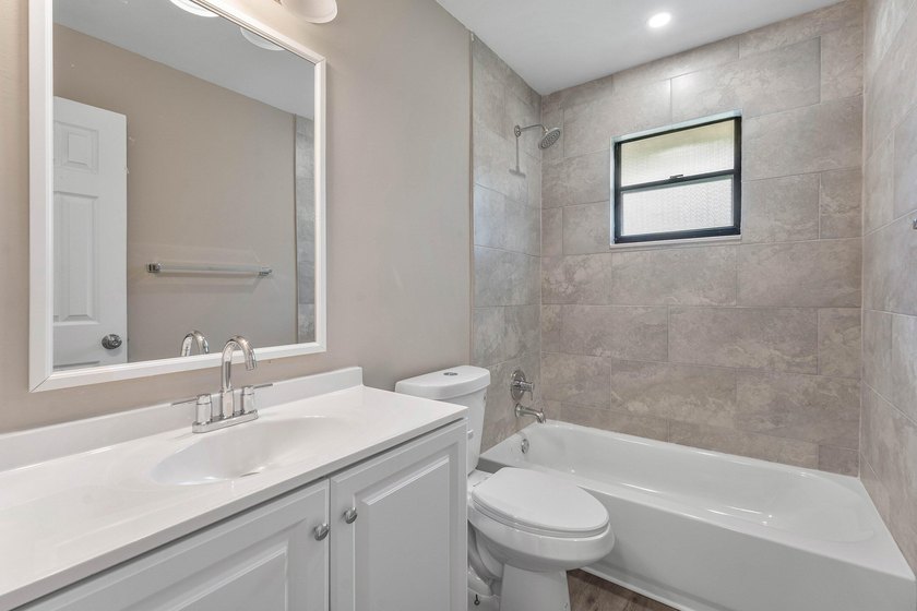 Welcome home to this updated 3-bedroom, 2-bath single-family - photo 11