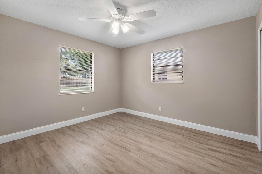 Welcome home to this updated 3-bedroom, 2-bath single-family - photo 12