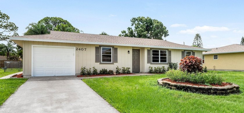 Welcome home to this updated 3-bedroom, 2-bath single-family - photo 16